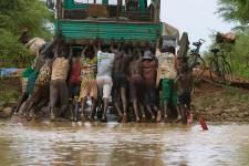 Men pushing truck, Burkina Faso